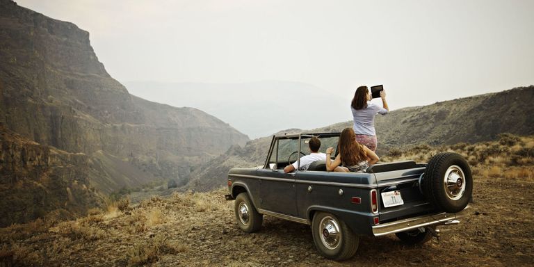 taking pictures on road trip